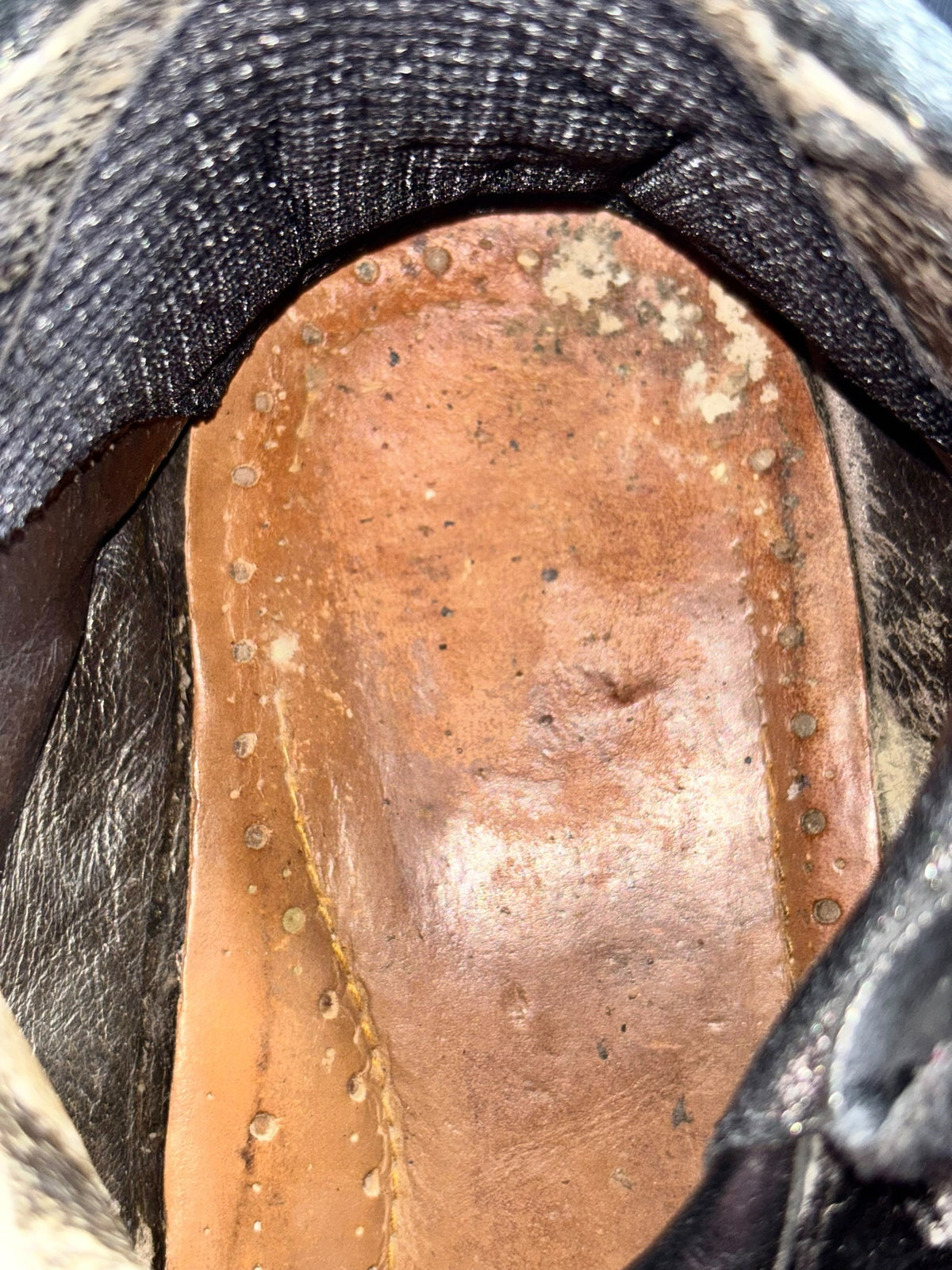 Vintage New Rock platform boots, showing worn tan insole and black collar trim