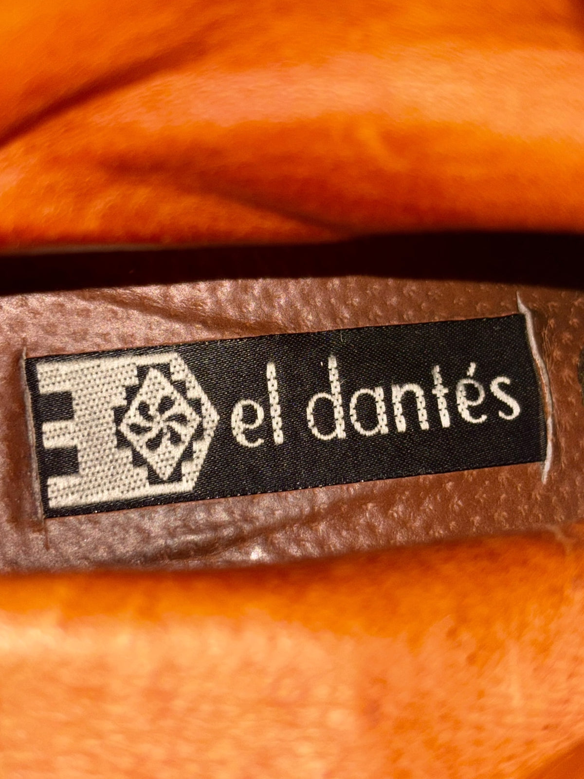 el dantes leather boot size label with logo patch on brown fabric