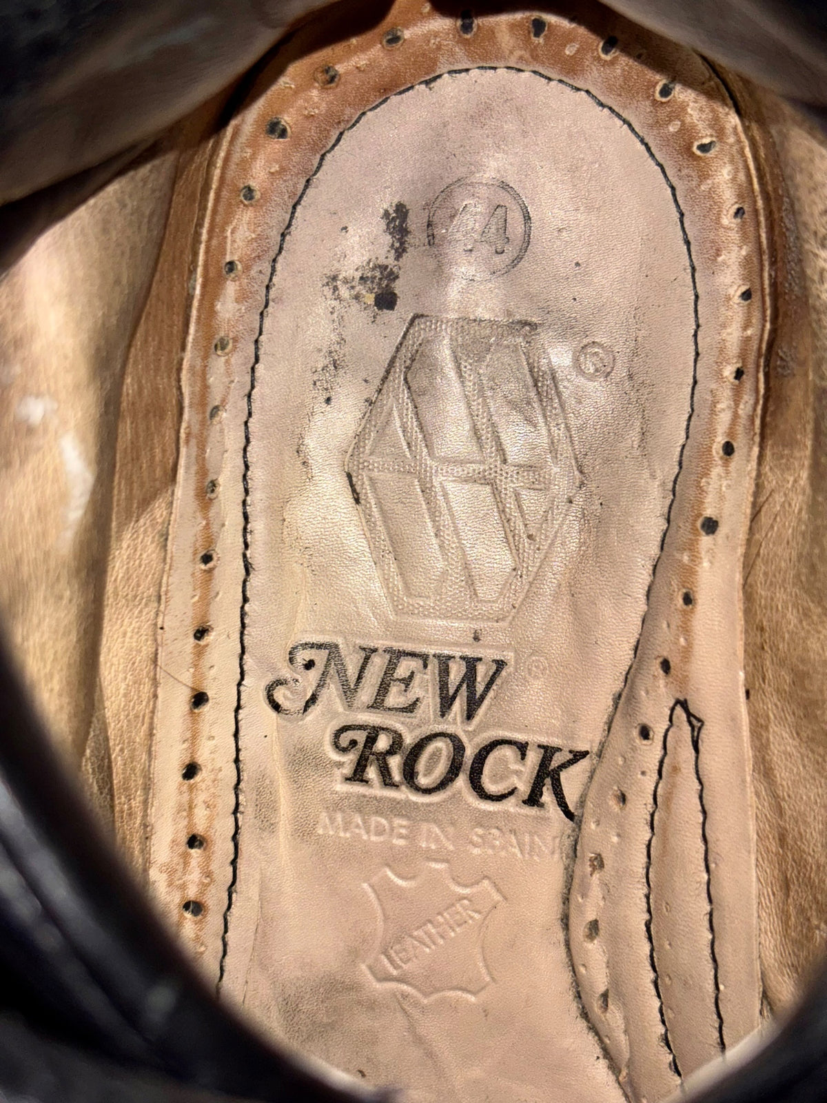 Leather platform boot insole lining with brand stamp and text