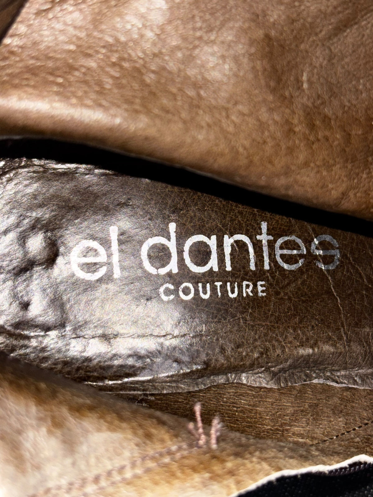 Vintage leather heel insole with “el dantes couture” logo text detail