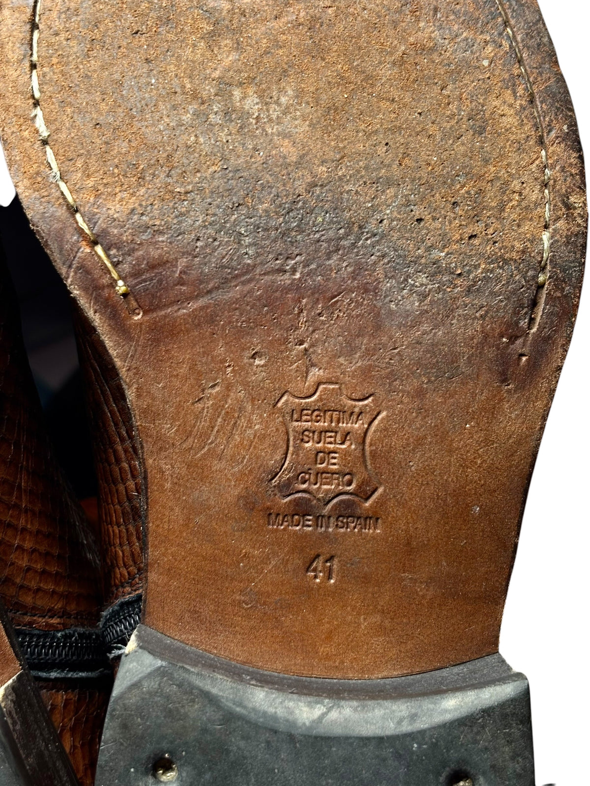 Boot interior sole with stamped text and size marking