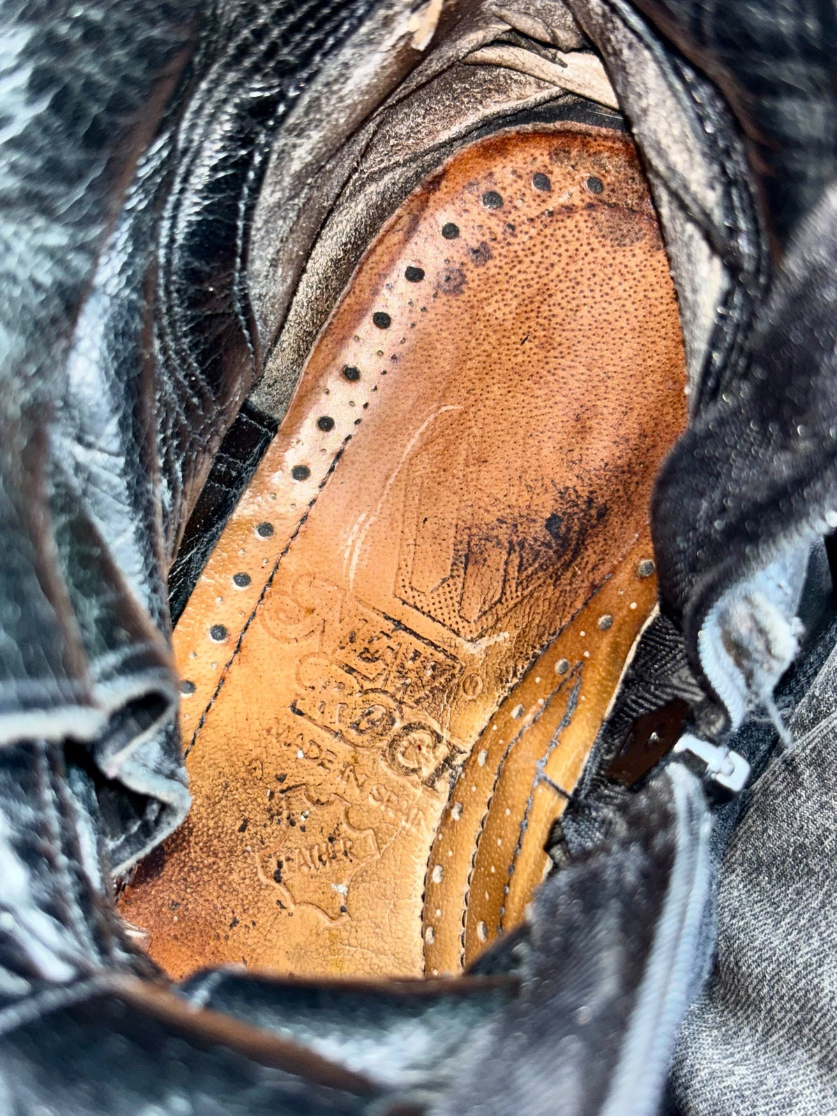 Vintage knee-high boots, textured tan lining and lace-up eyelets, worn leather look