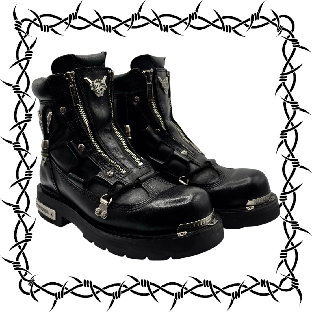 Black leather biker boots with double zippers and metal hardware, side view pair