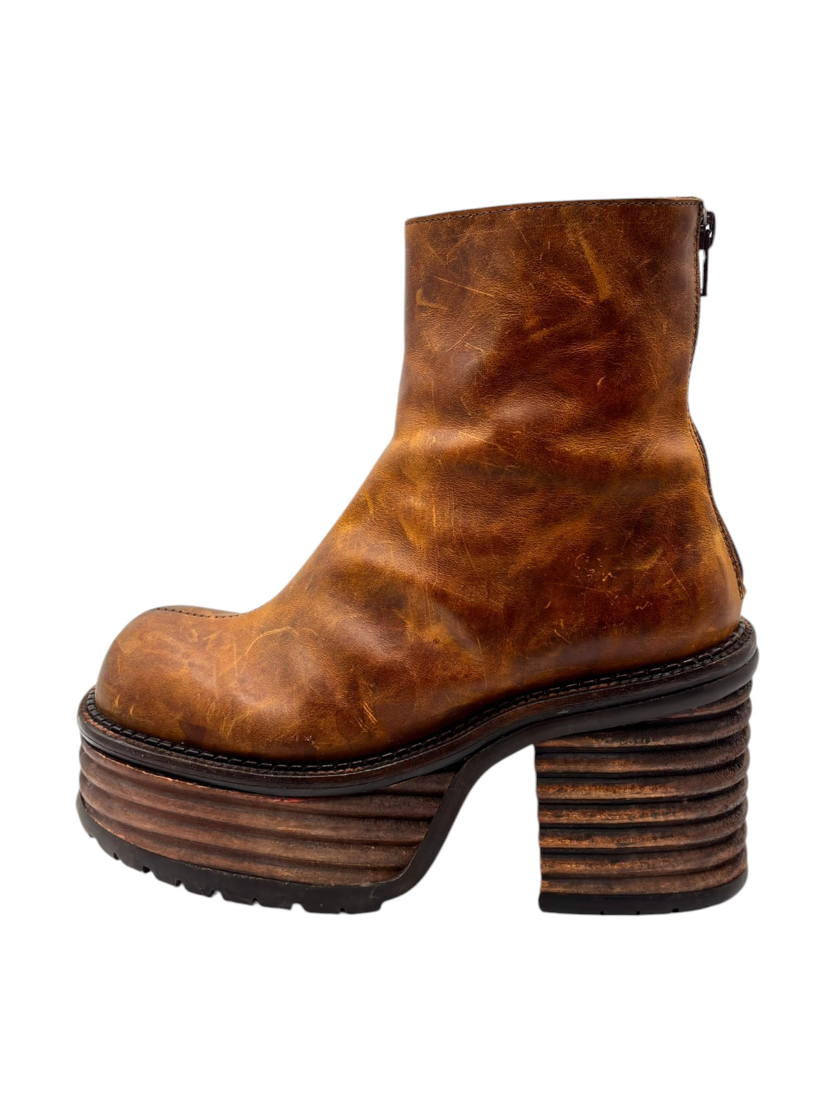 Brown leather ankle boots with rounded toe and stacked block platform heel
