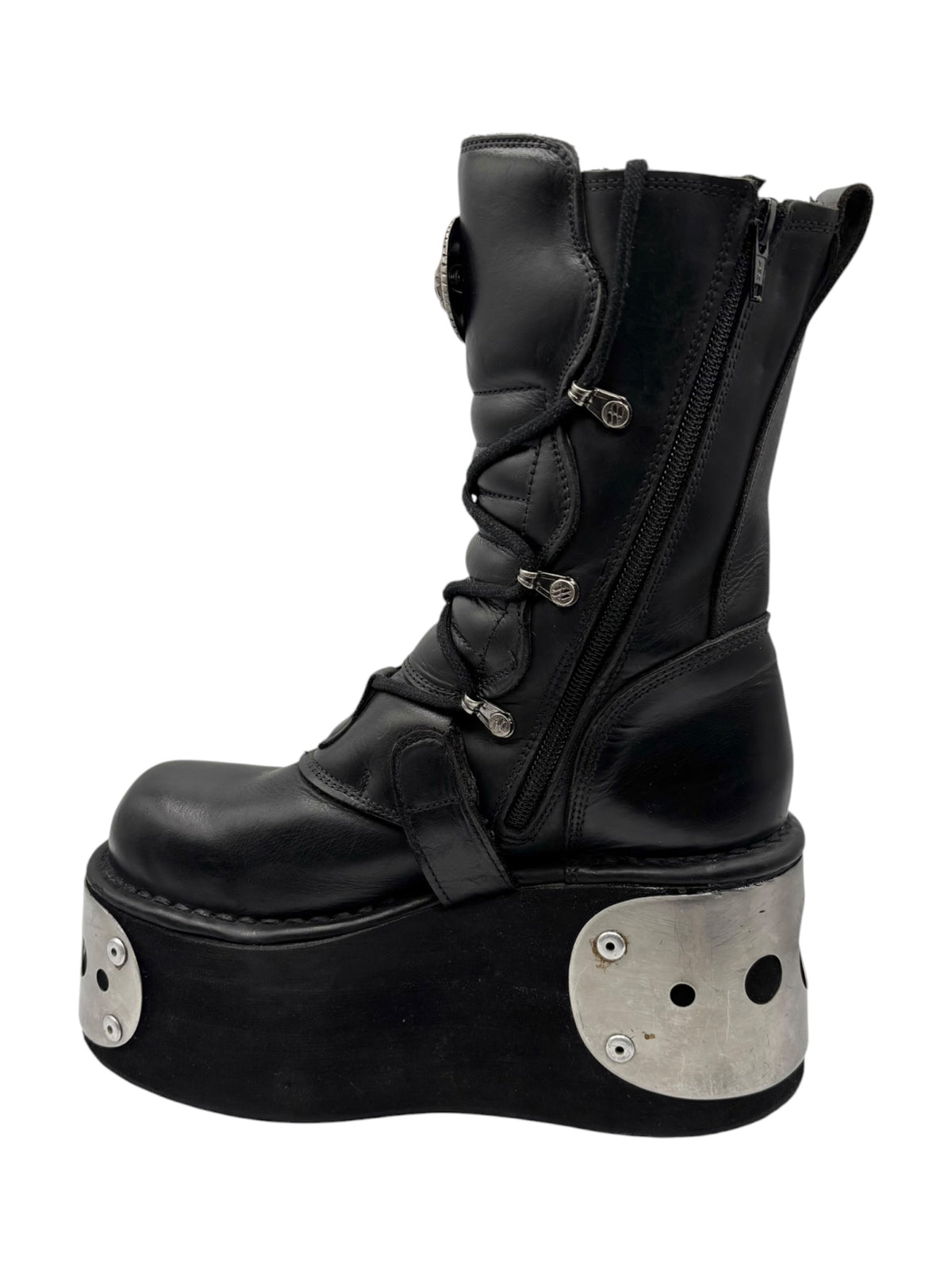 Black platform boots with lace-up details, side zipper, and silver sole plates