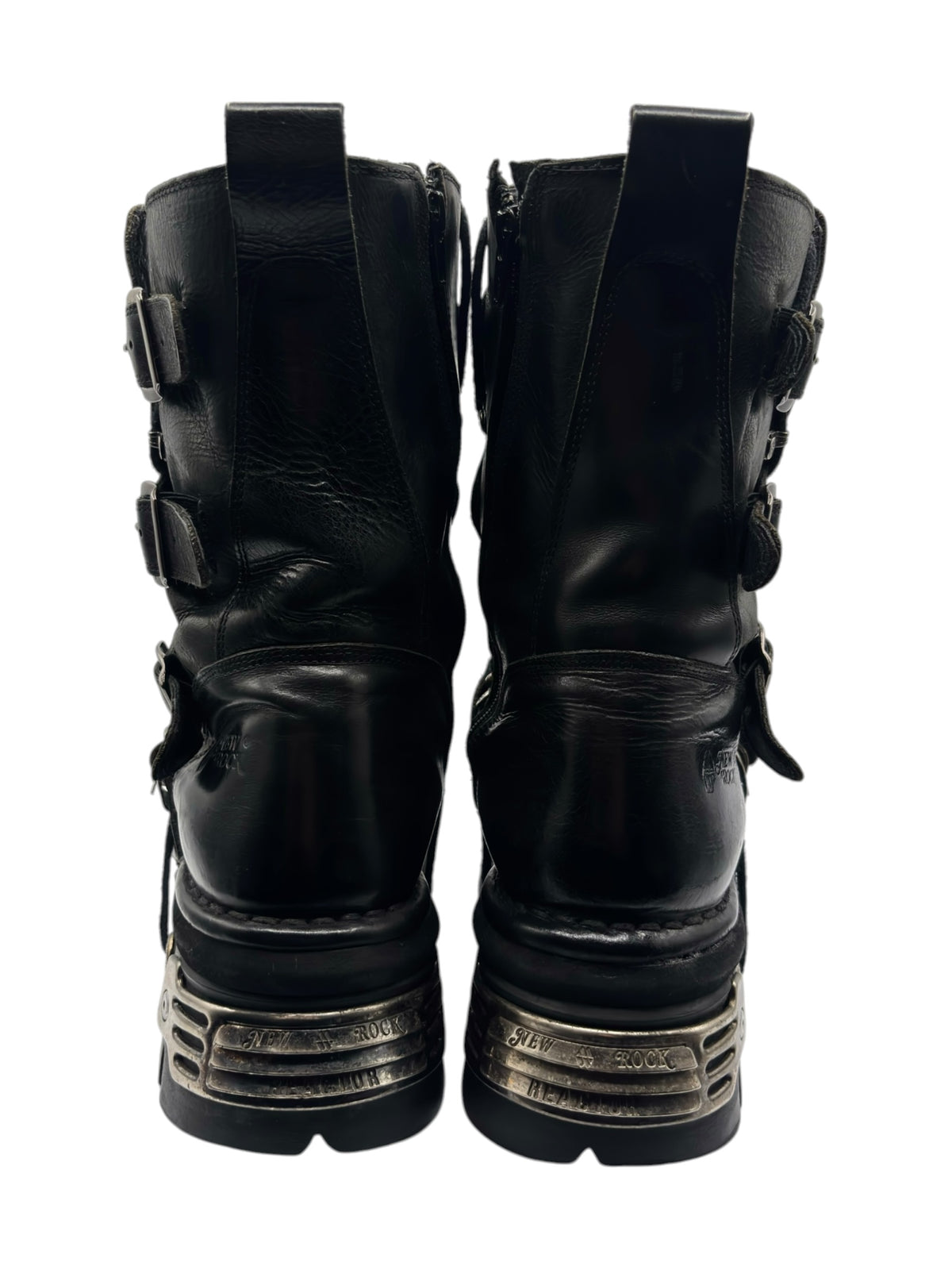 Black mid-calf reactor boots, back view with ankle straps and metal heel trim