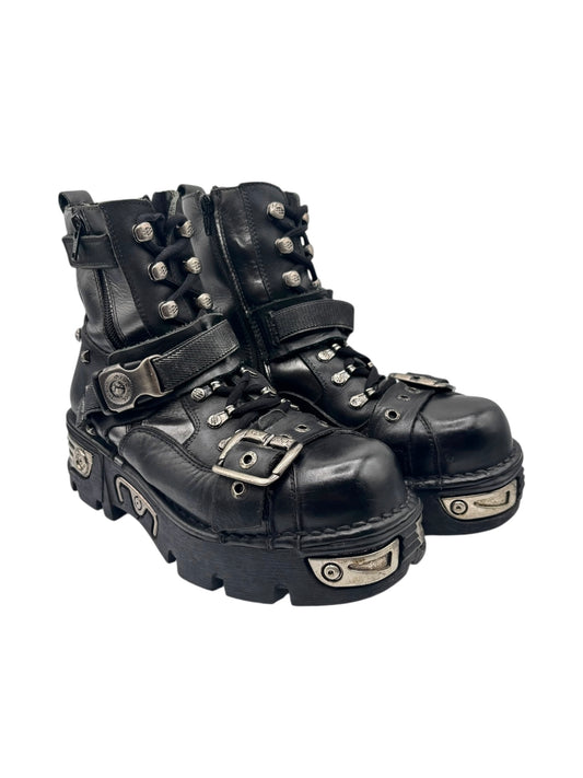 Techno platform boots, black leather look, chunky lug sole with straps and metal buckles