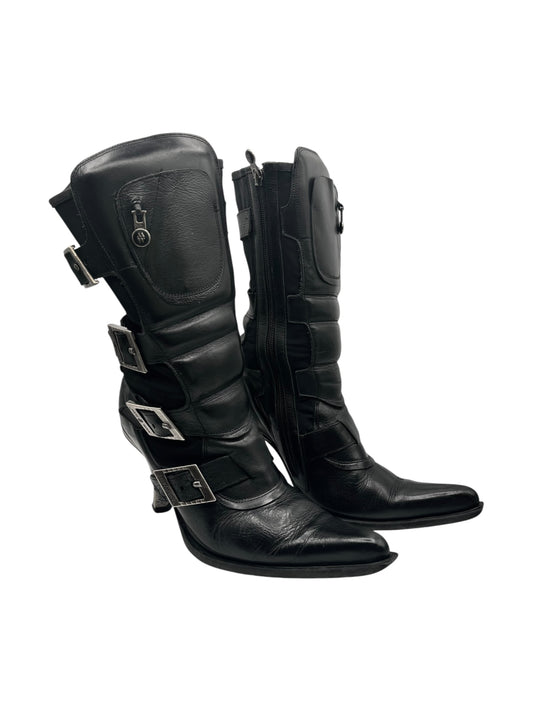 Black leather pointy-toe biker boots with buckles and side zipper
