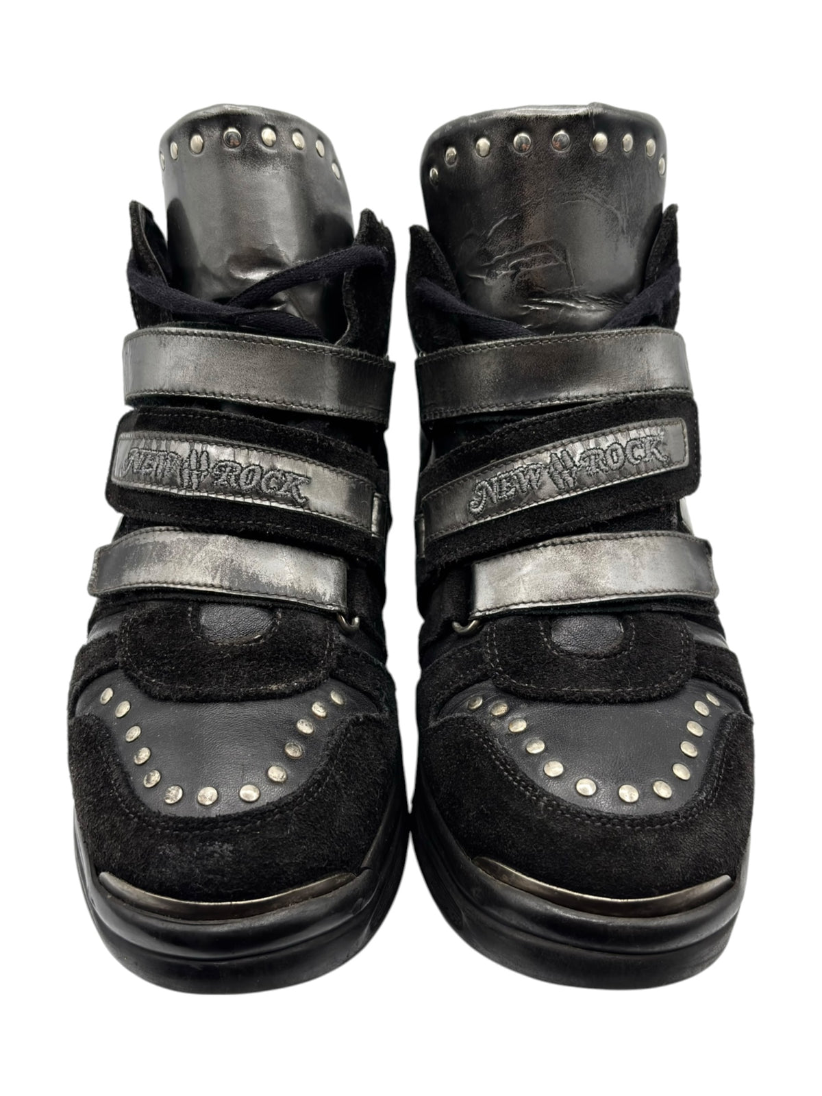 Black and gray strap sneaker front view with stud trim on toe panels