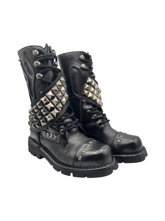 Black punk lace-up boots with pyramid studs on outer panels, metal eyelets, chunky sole