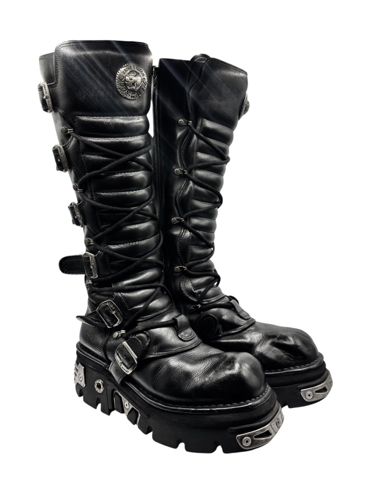 Knee-high lace-up boots with side buckles and chunky tread sole, black
