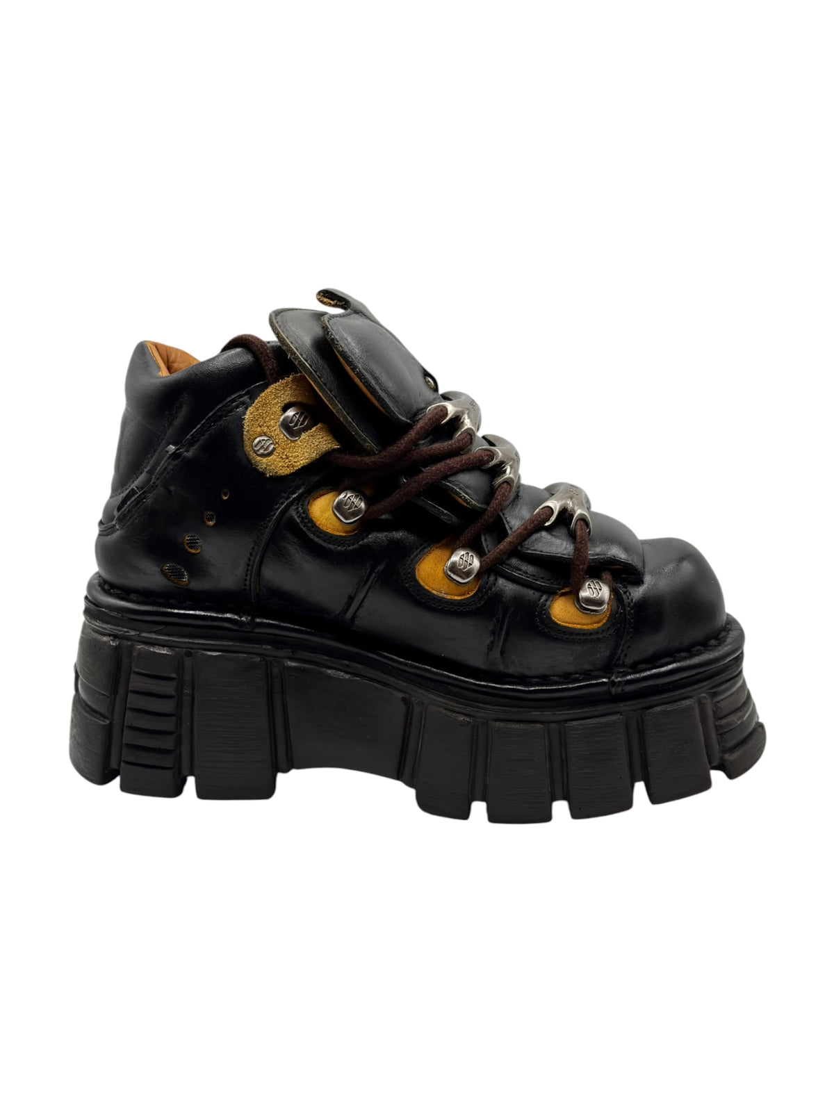 Black platform boot with lace-up front, round eyelets, and rugged block heel sole.
