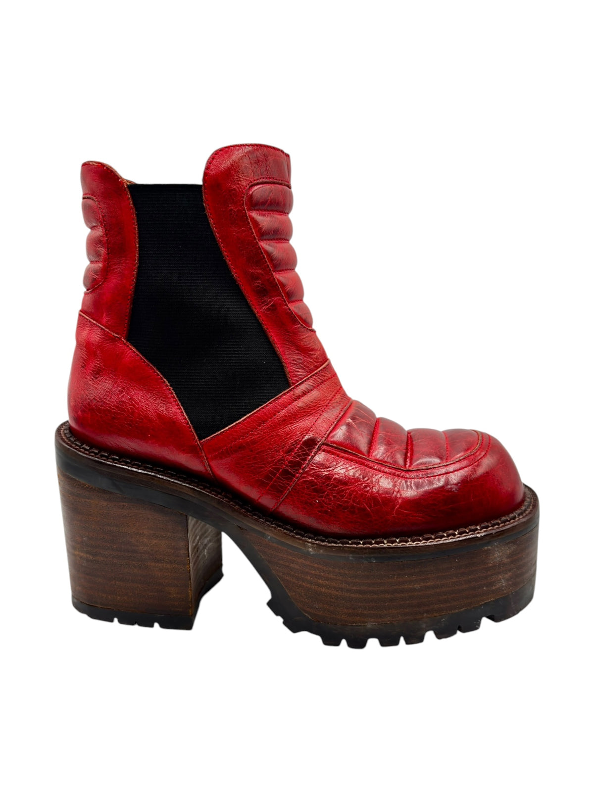 Red leather ankle boots with black elastic gore and treaded platform block heel