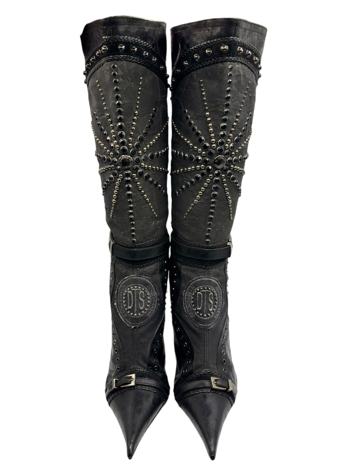 Knee-high vintage boots with studded detailing, pointed toe, and oval DS logo patches
