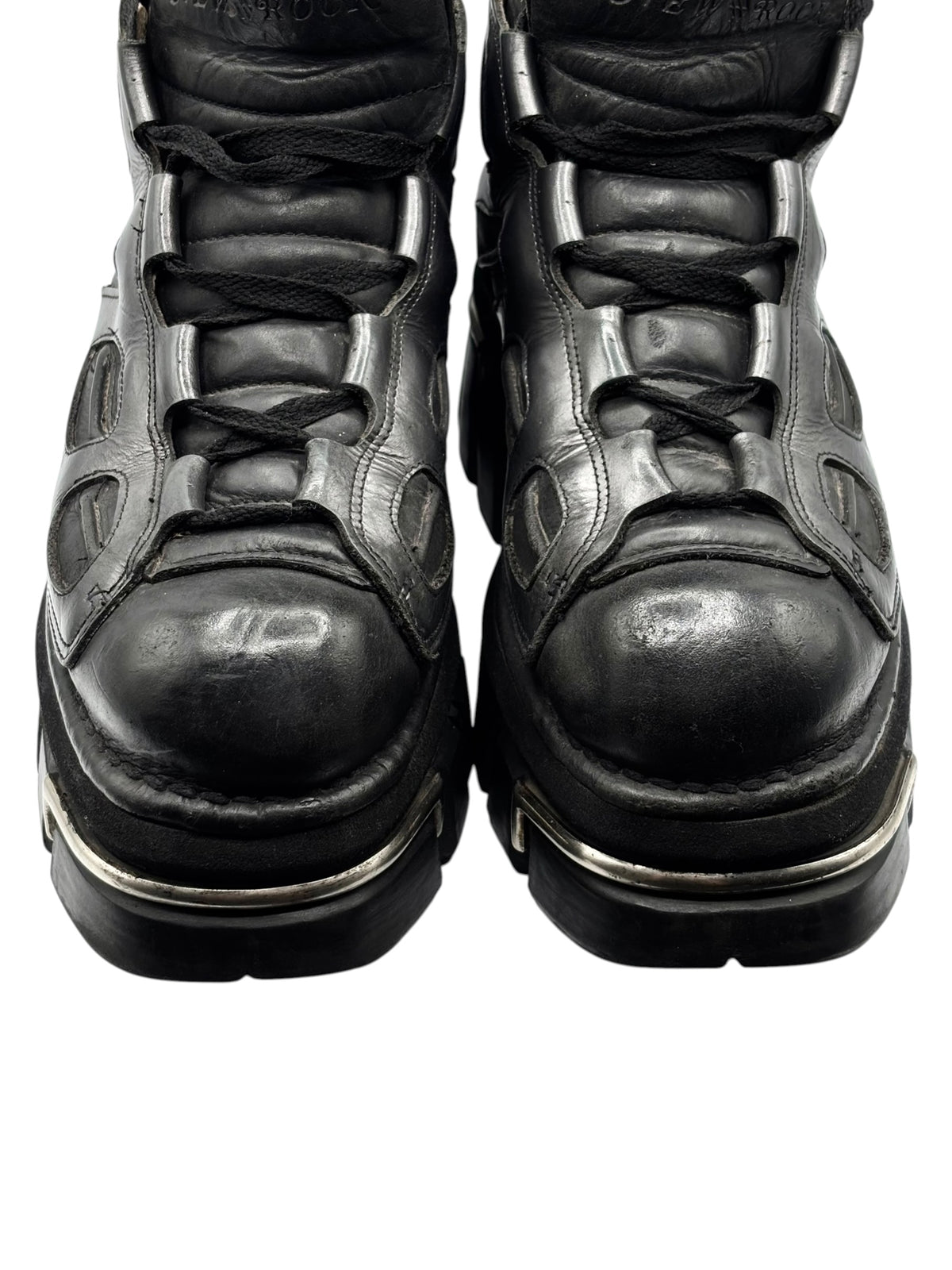 Black leather platform boots front view with laces and reinforced toe caps