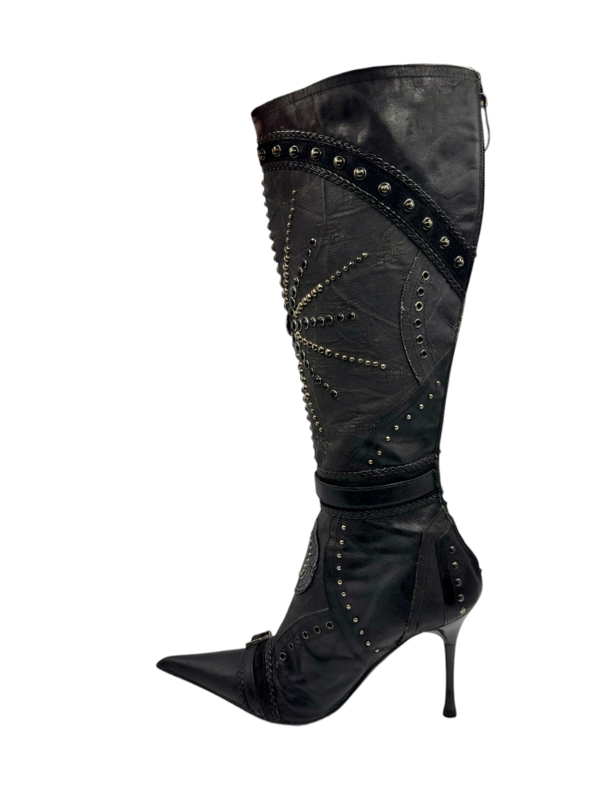 Black knee-high boots with studded chevron stitching and tall stiletto heel