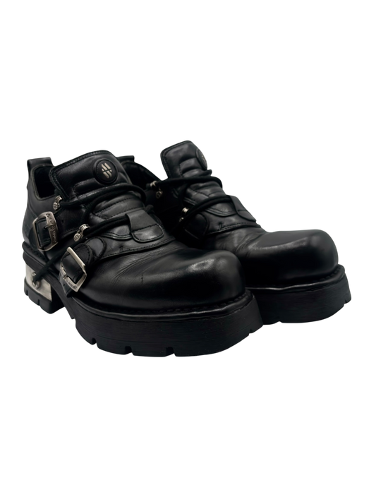 Black leather lace-up boots with front buckles and thick raised sole