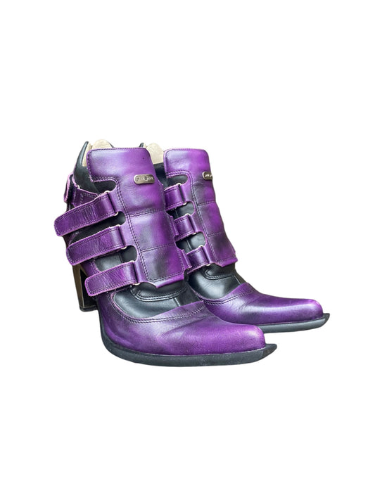 Purple leather ankle boots with buckled straps and chunky low heels