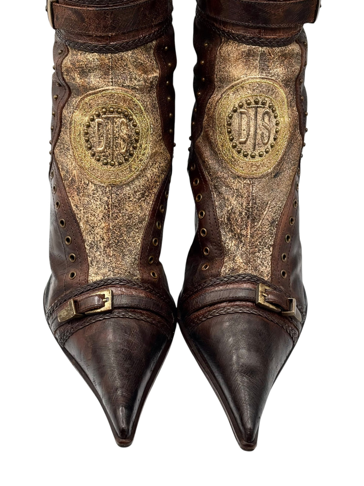 Vintage knee-high boots with pointed toes, dark brown leather and gold crest, buckle straps