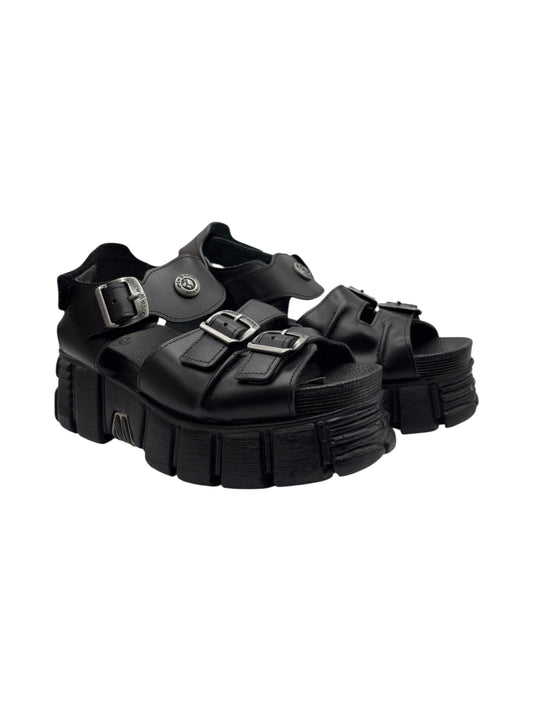 Black platform sandals with chunky sole and adjustable buckle straps