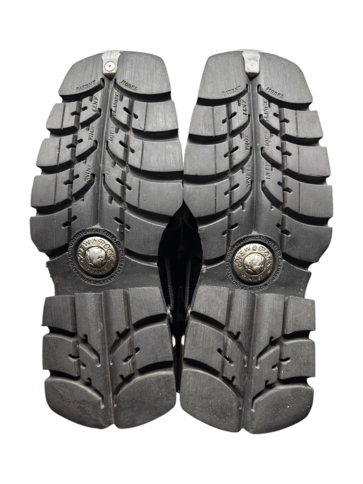 Vintage New Rock pluto platform boots: rugged platform boot soles, bottom view of pair