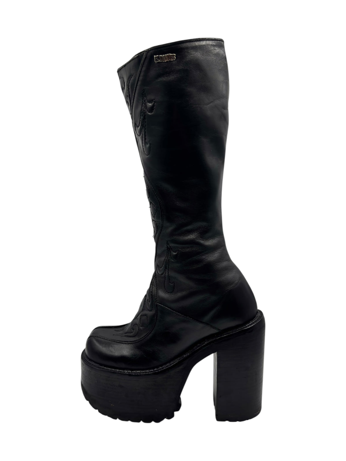 Black knee-high leather platform boots with chunky heel and side stitching