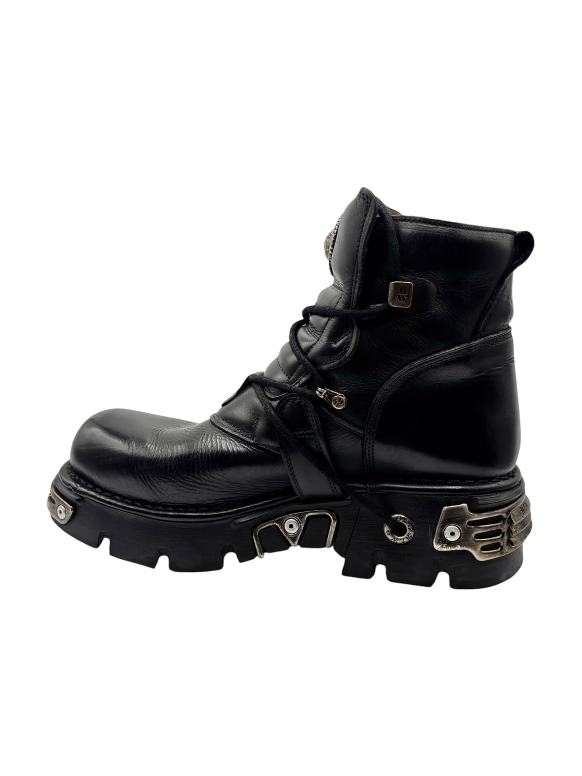 Black leather ankle boots with lace-up closure, side strap, and chunky lug sole