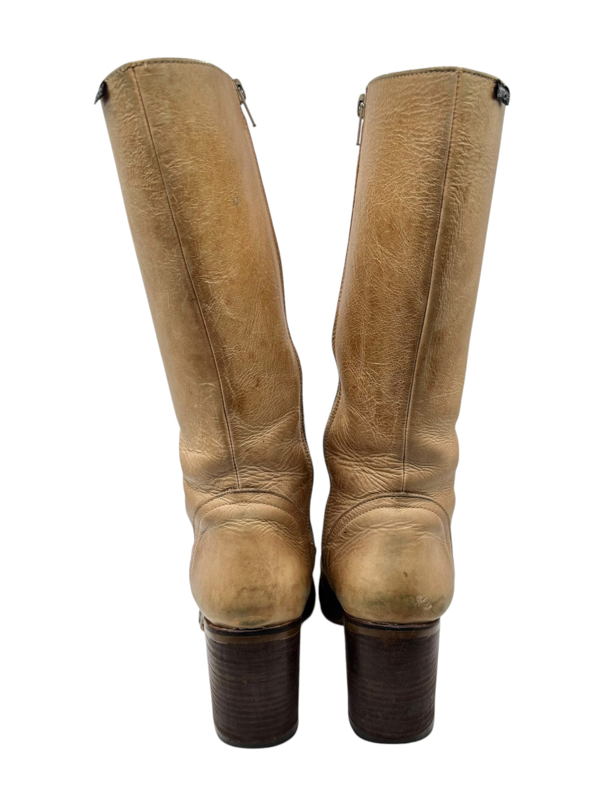Beige knee-high leather boots back view with stacked block heels and zip closure.