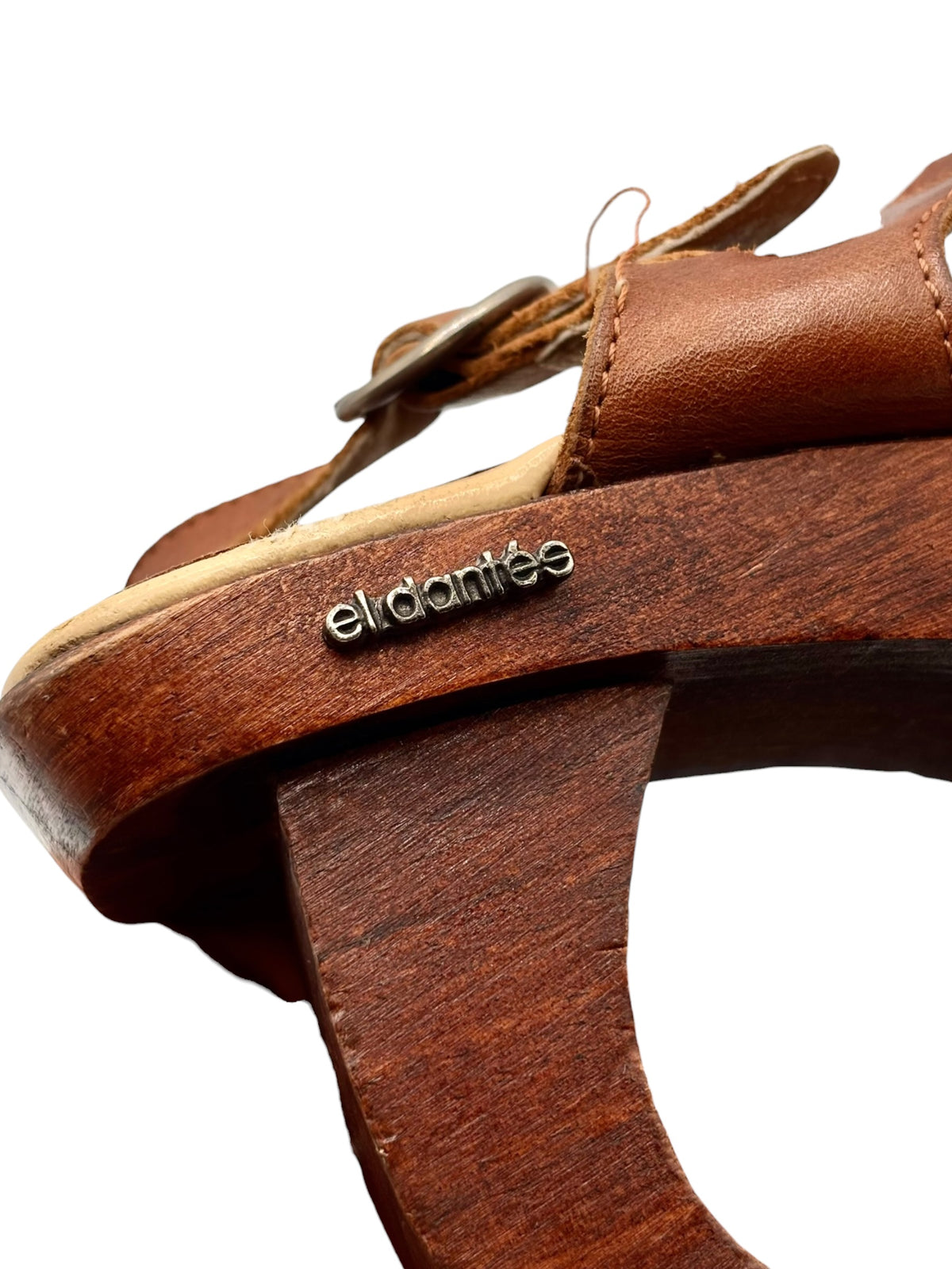 Brown leather strap with El Dantes logo on the platform sandal footbed
