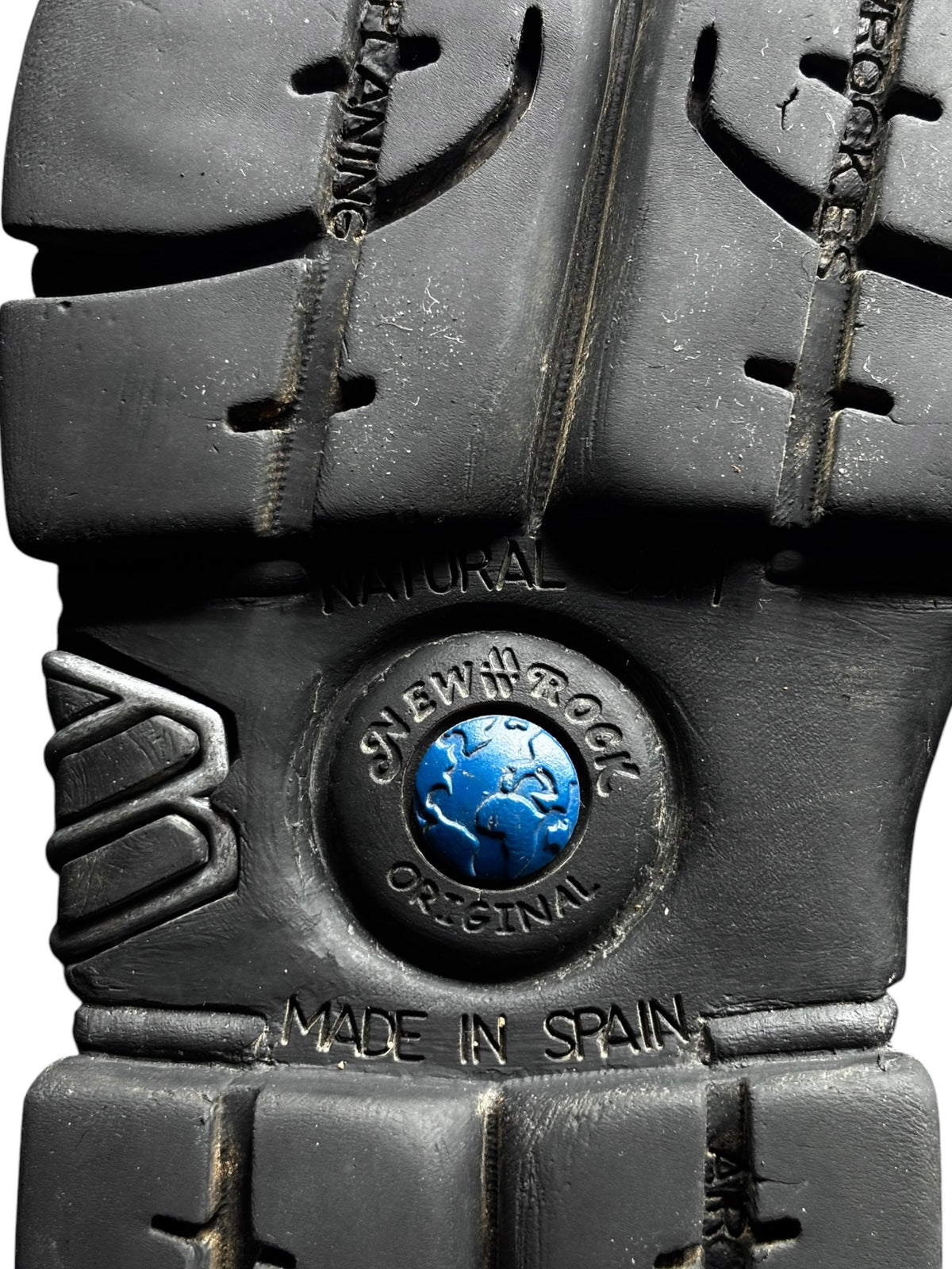 Black platform boot side with cross strap details and New Rock logo badge