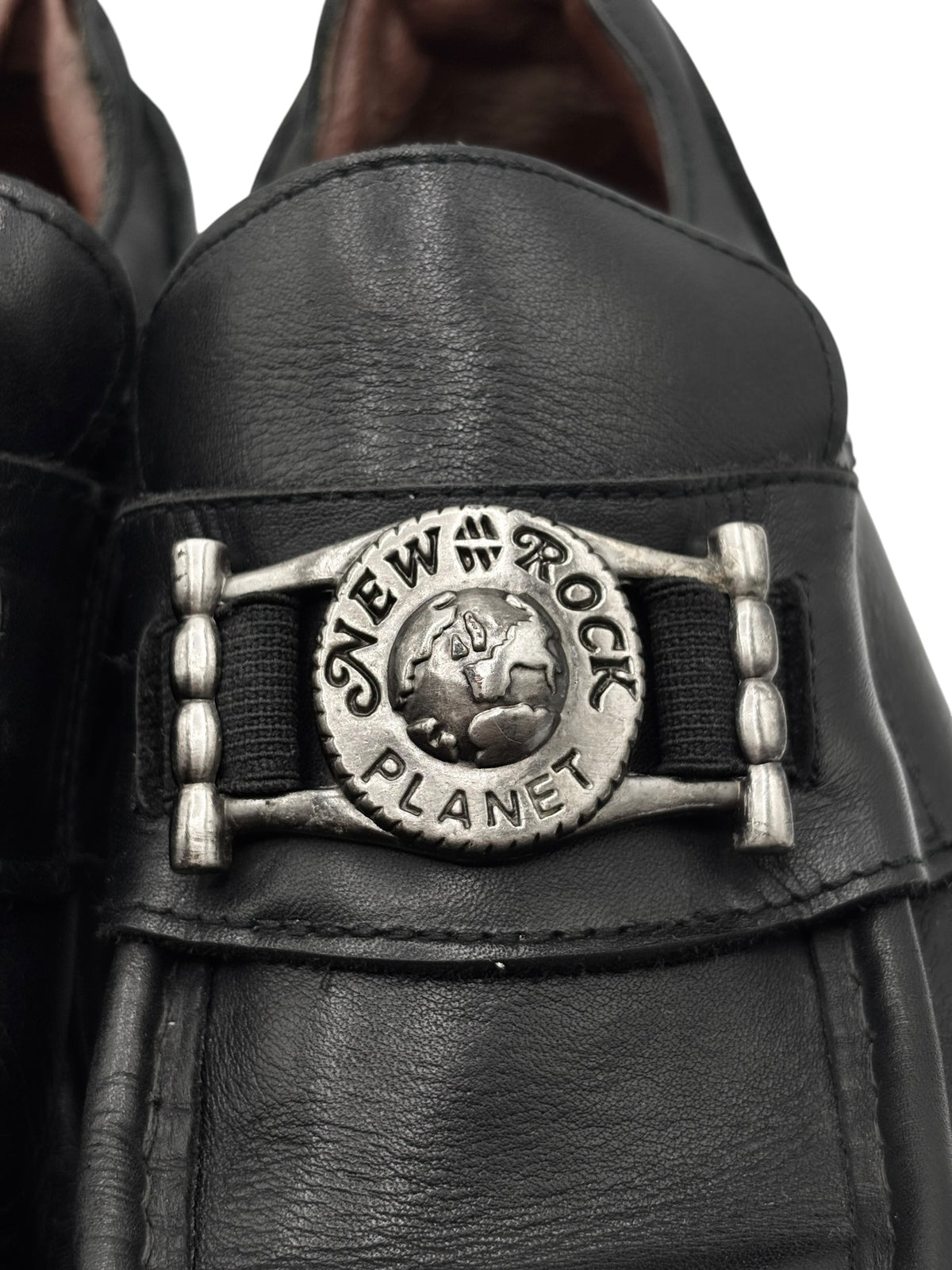 Vintage New Rock leather loafer buckle with airplane emblem medallion