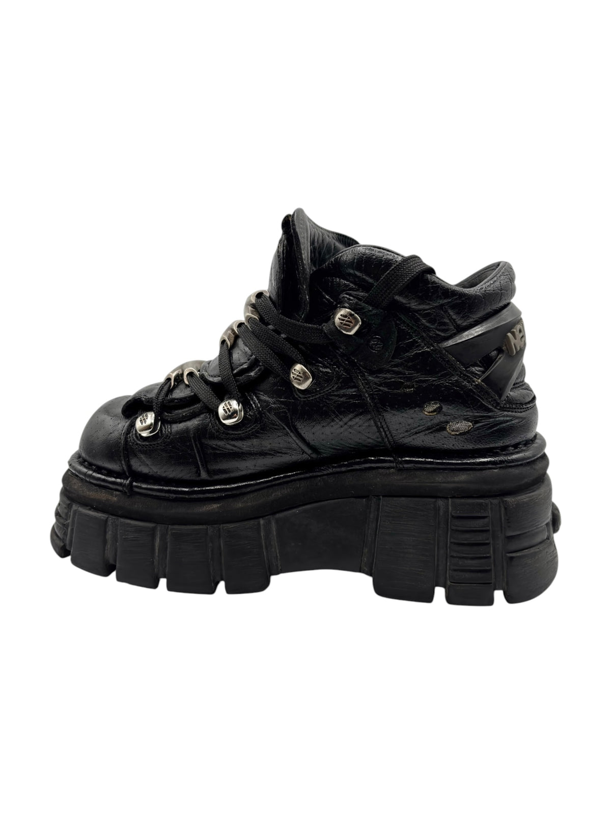 Black New Rock platform boots with crisscross laces and studded accents