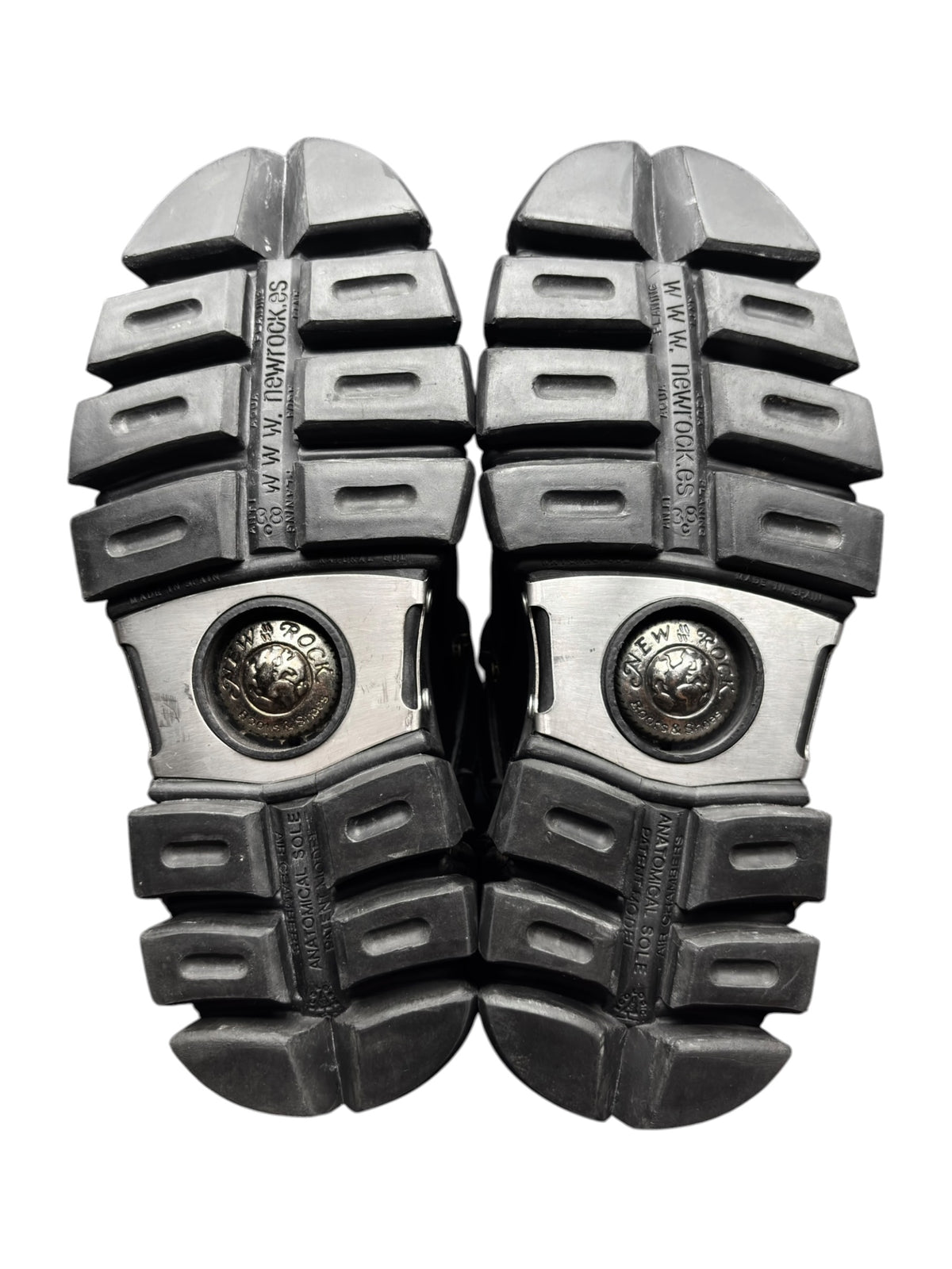 Pair of New Rock platform boot soles, rugged tread pattern and circular logo