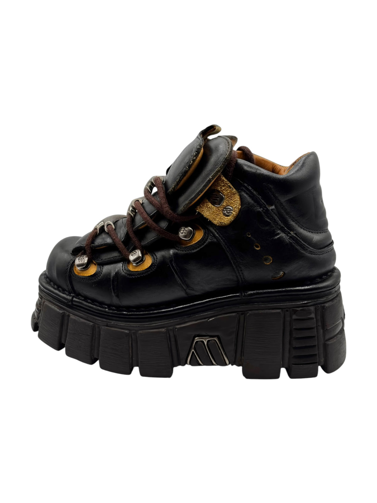 Black leather lace-up platform boot with thick sole and dual buckle straps.