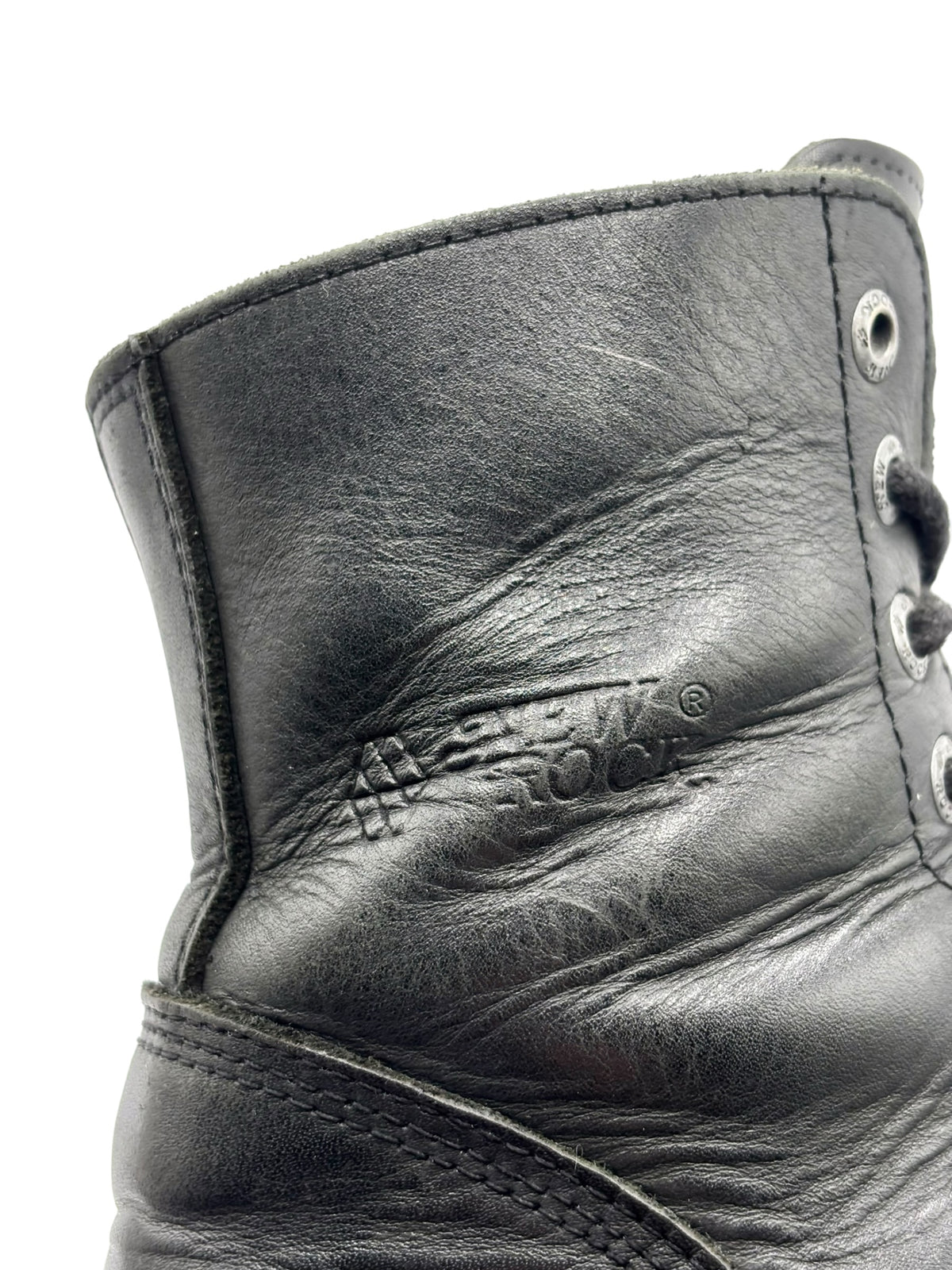 New Rock Mili black leather boot upper close-up with eyelets and small embossed logo