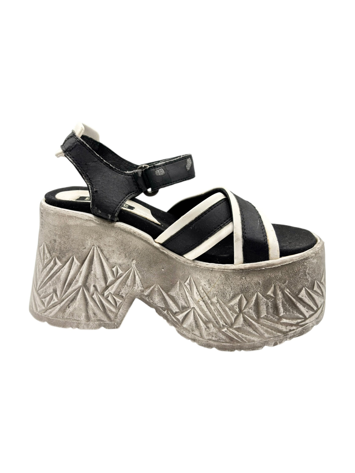Black-and-white strappy platform sandals with textured silver block heel