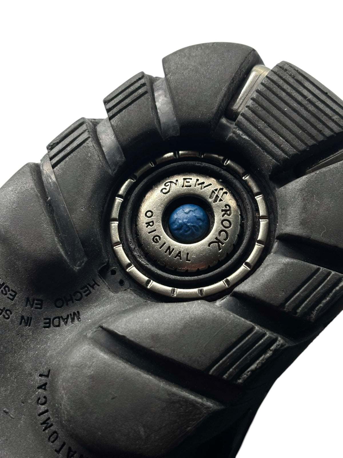 New Rock platform boots outsole close-up with round logo and ribbed traction tread
