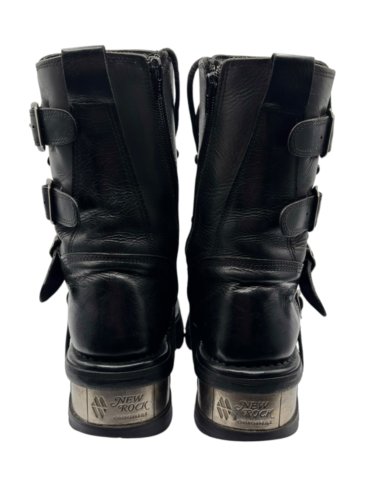 Pair of black mid-calf boots from the back with buckles and adjustable strap loops
