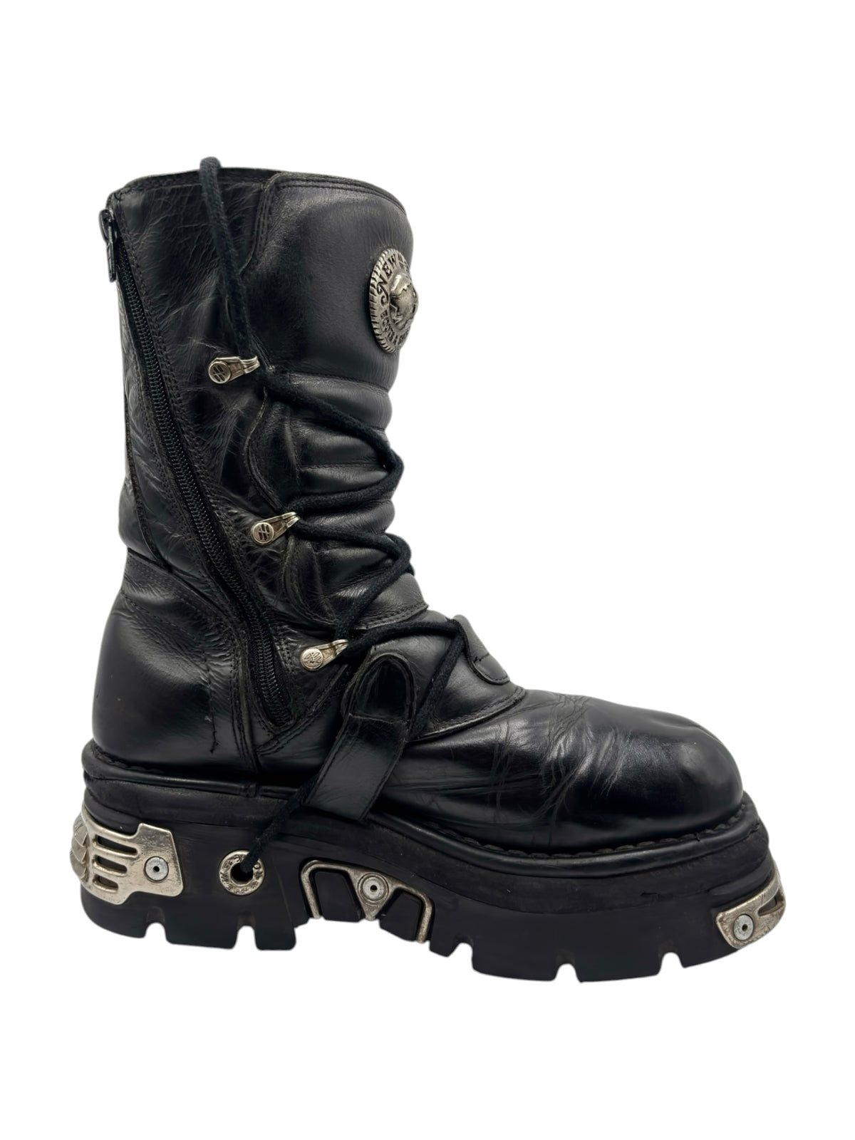 Black mid-calf leather reactor boots with side strap and metal buckle details