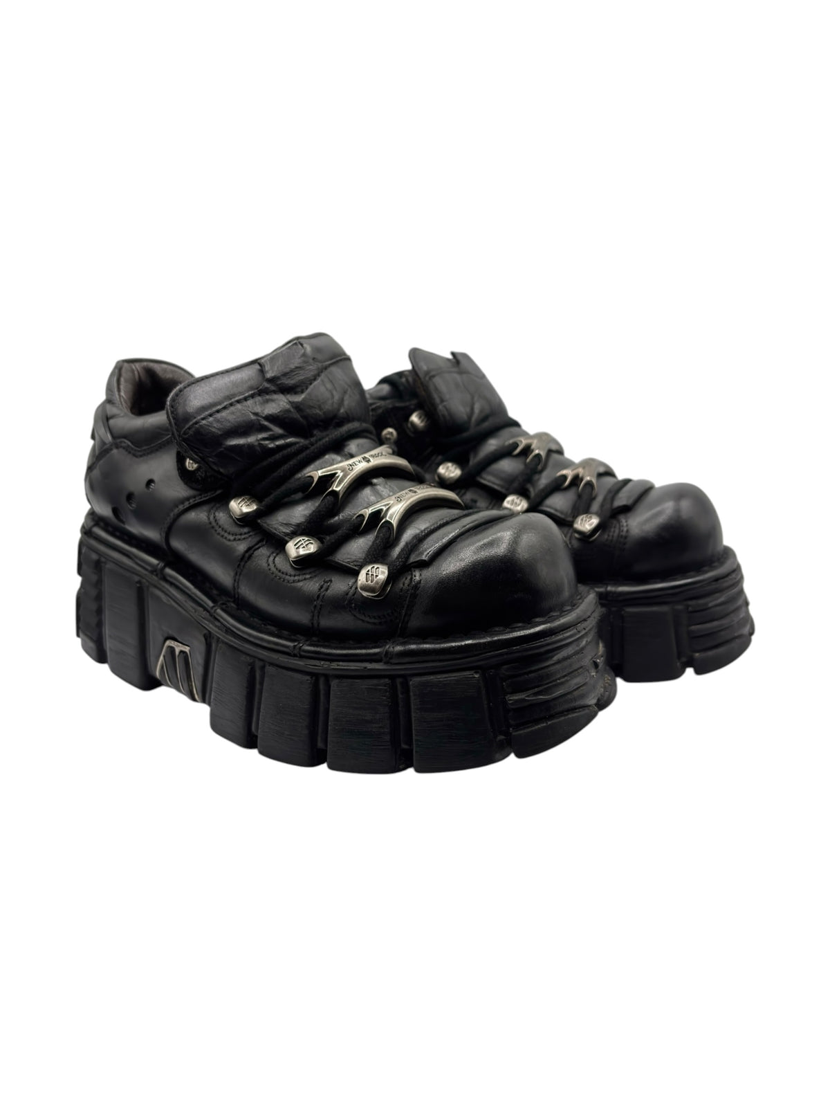 Vintage black leather platform boots, lace-up front and chunky outsole with deep tread.