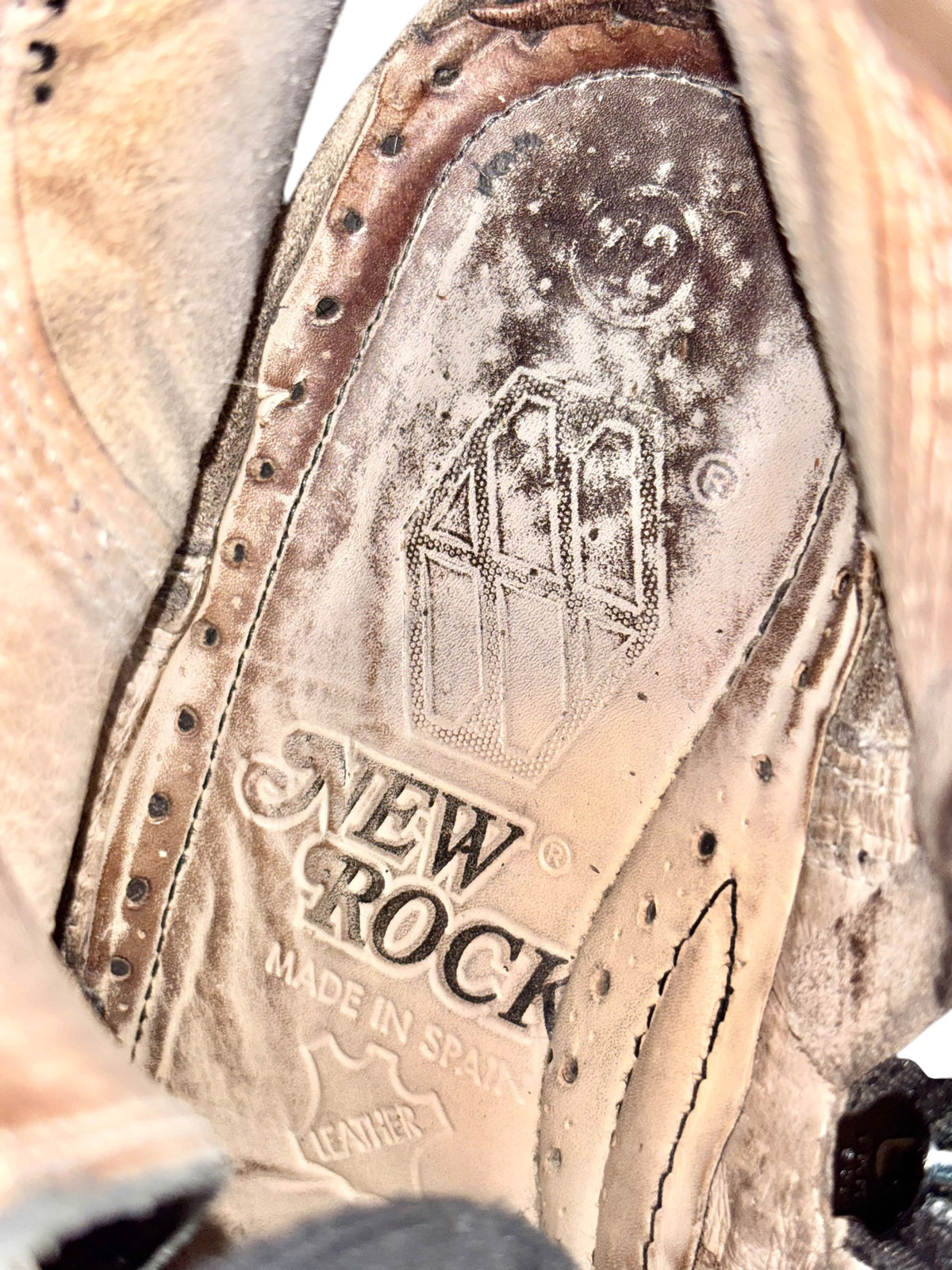Vintage New Rock mid-calf leather boot close-up with interior branding label