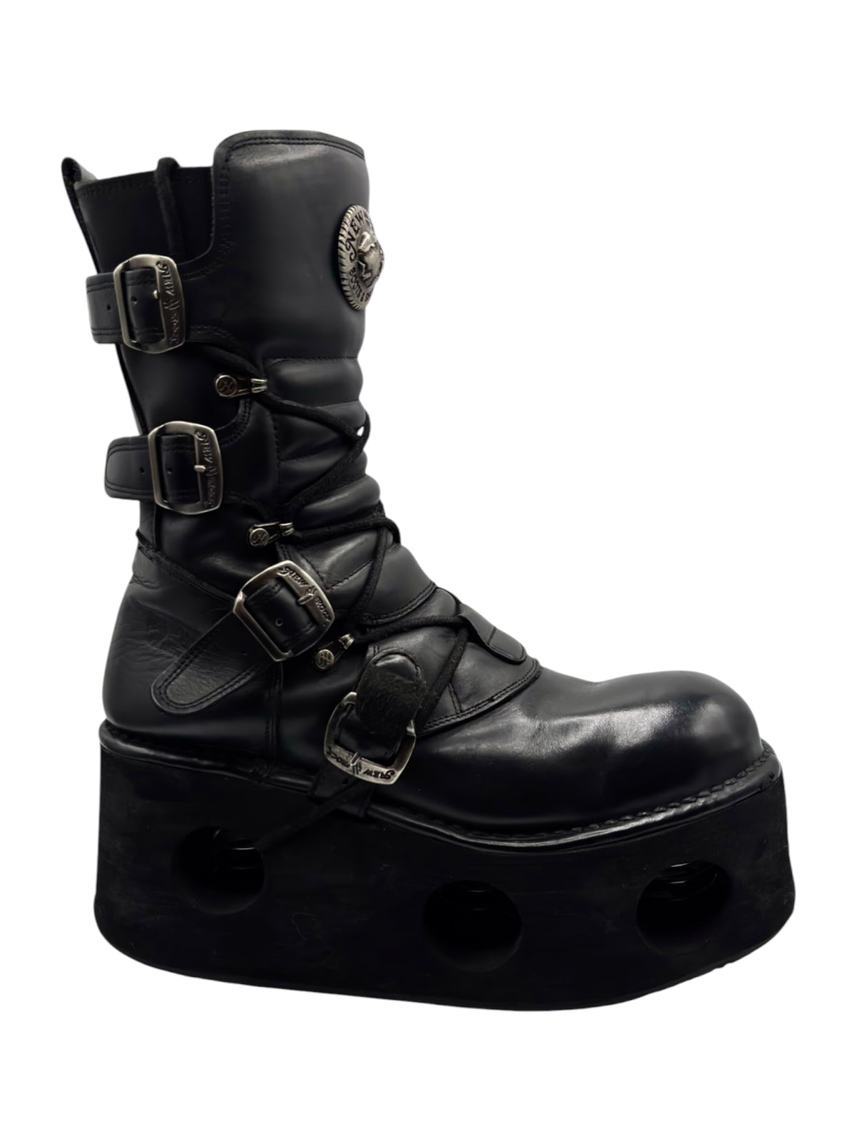 Black mid-calf platform boots with ankle strap and metal buckle closures