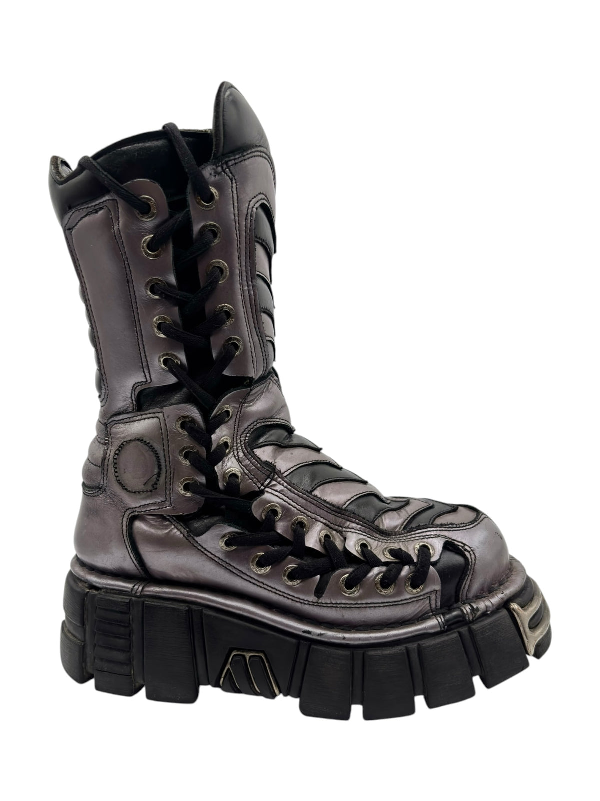 Black platform boots with lace-up front, textured toe panel, and thick tread sole