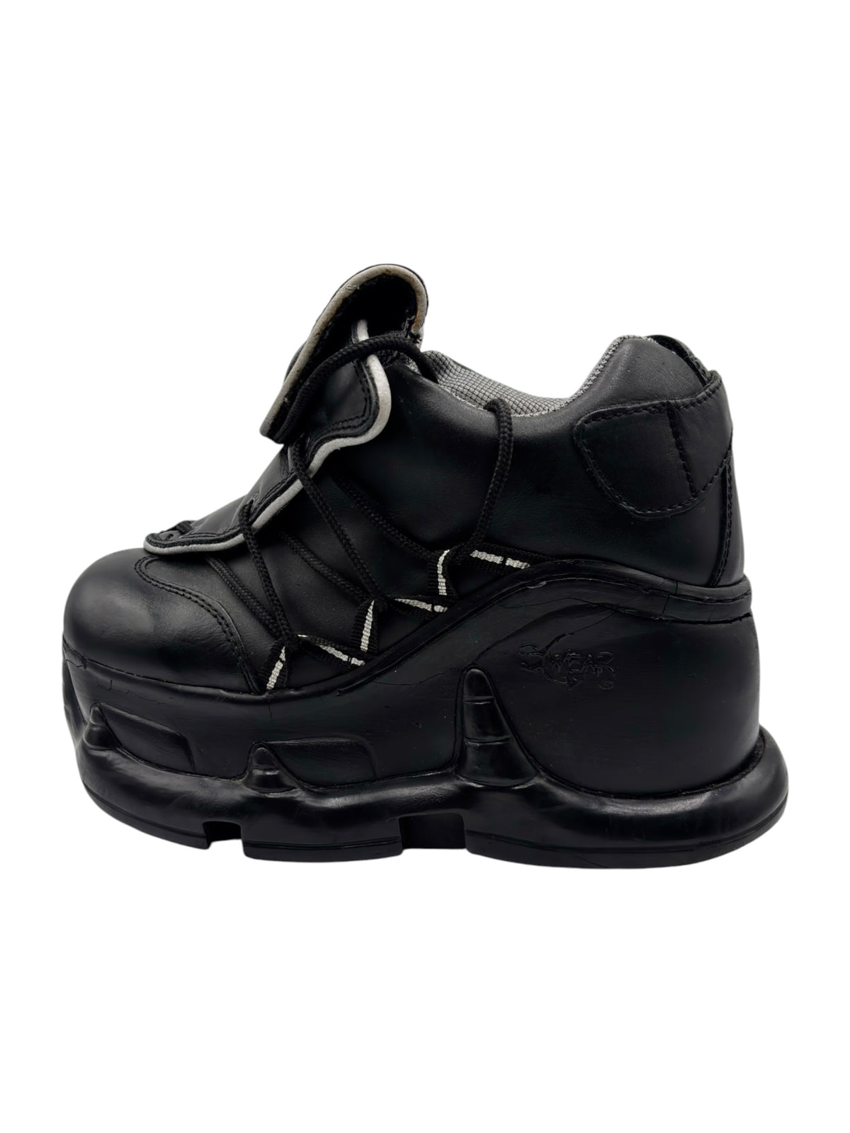 Black ankle-height platform boots with adjustable strap and cushioned collar.