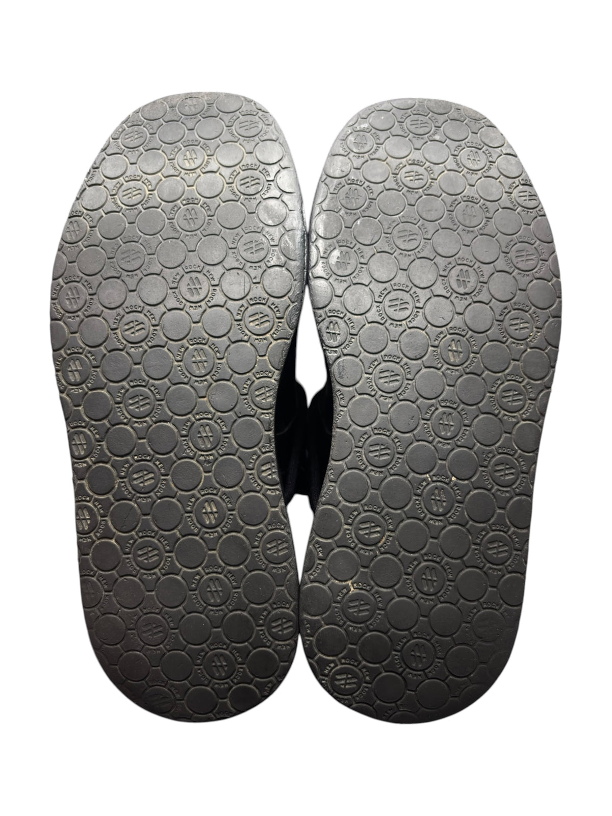 Black platform boot outsoles with raised bubble-pattern tread