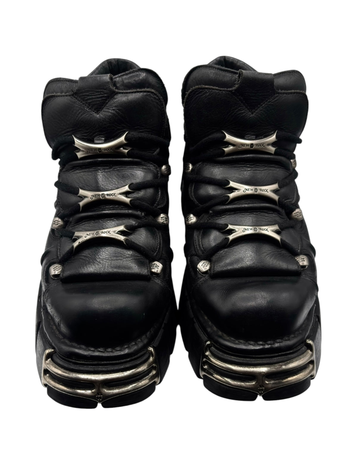 Black platform boots back view with gold-toned heel stripes and laces