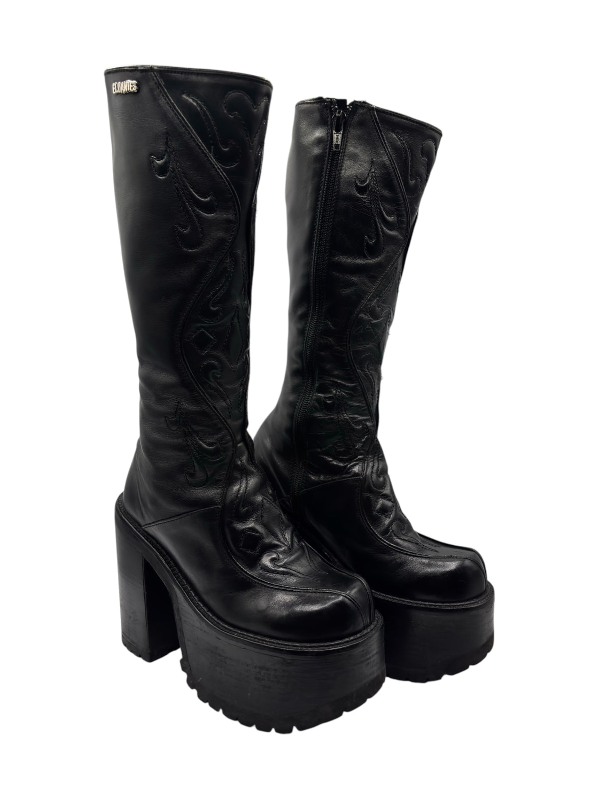 Black knee-high leather platform boots with block heels and side zipper closures
