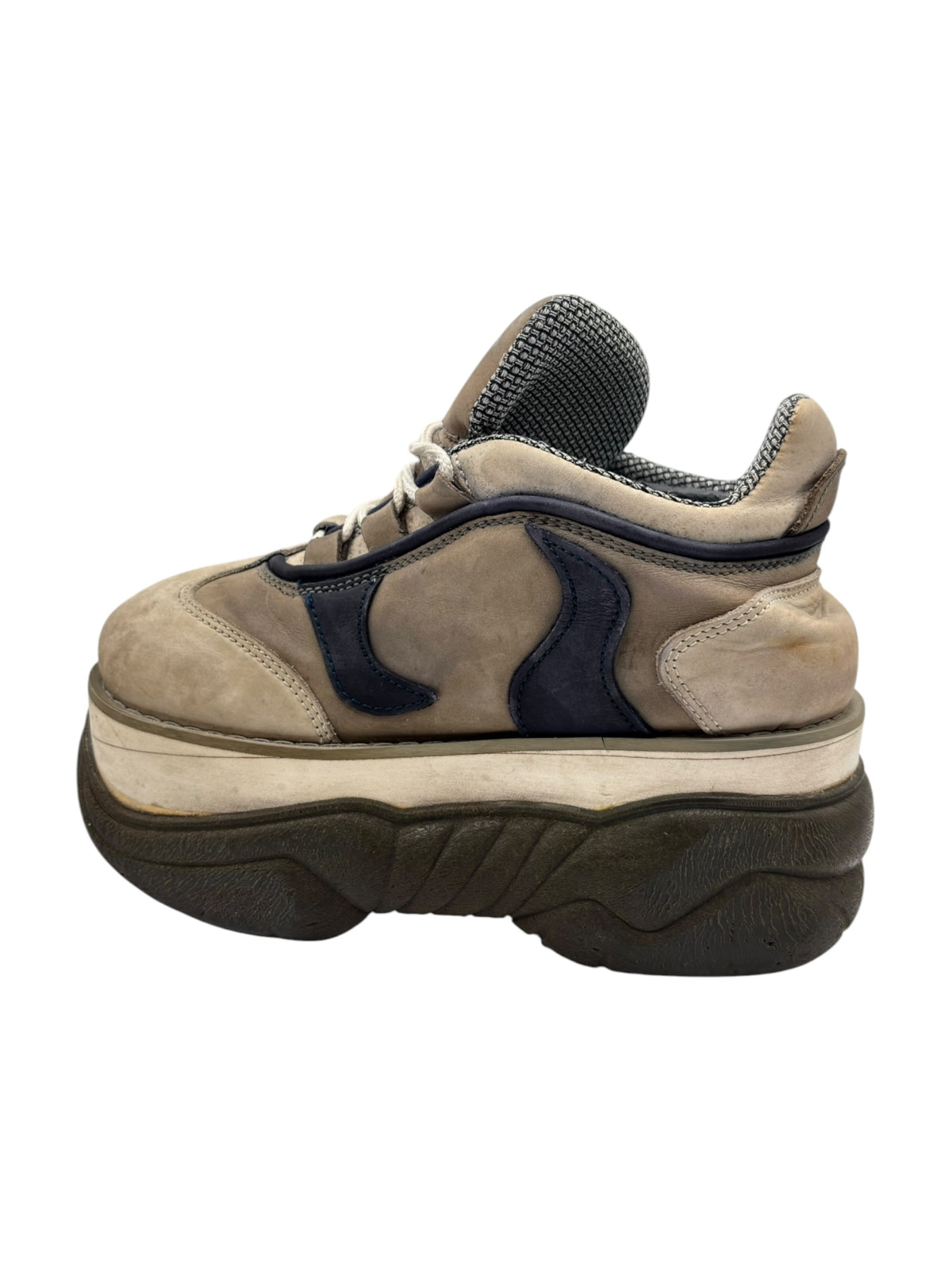 Beige lace-up platform sneaker-style boot with navy center panel and cushioned collar