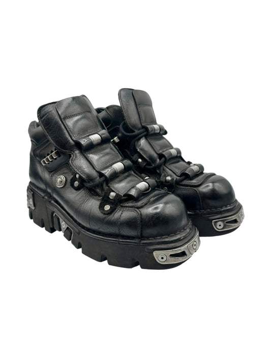 Vintage New Rock platform boots oblique view in black leather with multiple buckles
