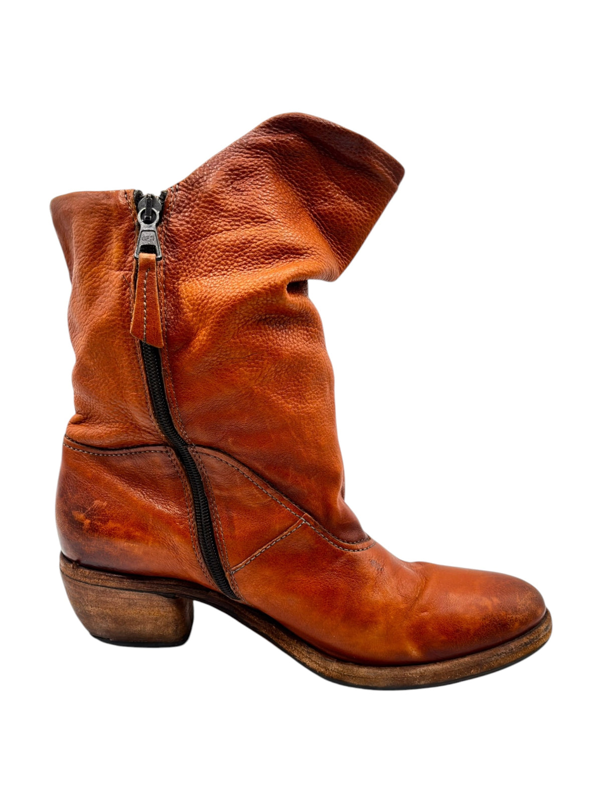 Orange-brown leather mid-calf boots with side zipper and stitched panels